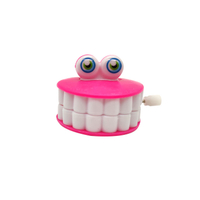Divertidos juguetes de los dientes plásticos de viento para los juguetes de los dientes