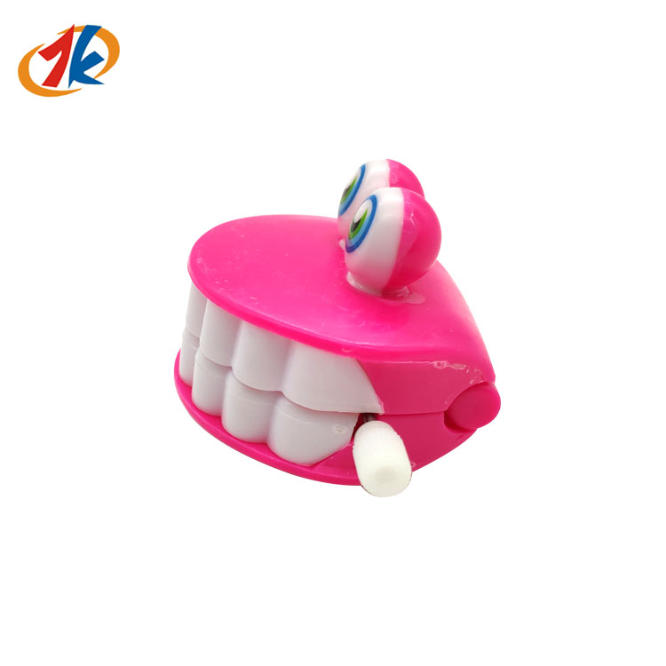 Divertidos juguetes de los dientes plásticos de viento para los juguetes de los dientes